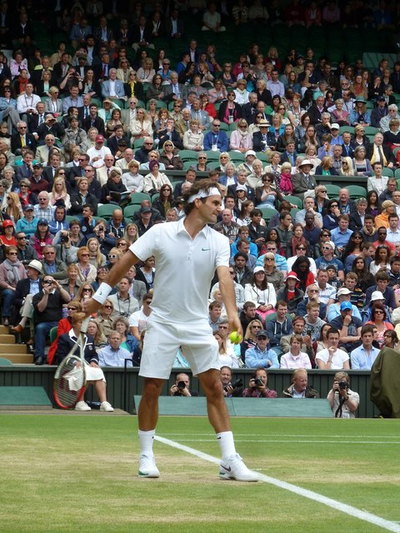 Roger Federer Serving at Wimbledon