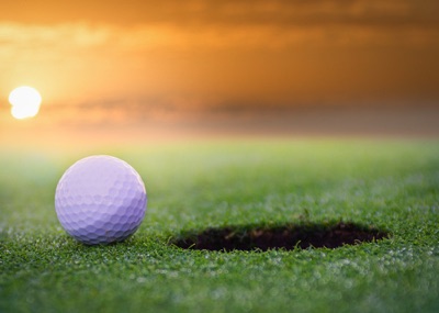 Golf ball near hole