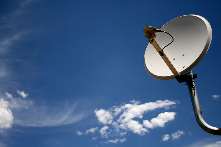 Satellite Dish Against a Blue Sky