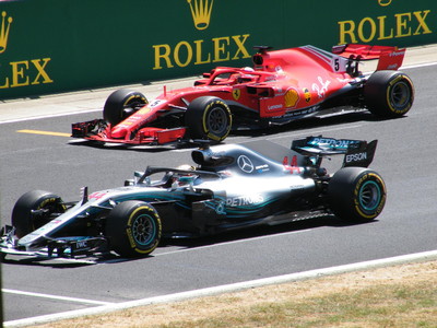 Mercedes and Ferrari F1 Cars on Grid
