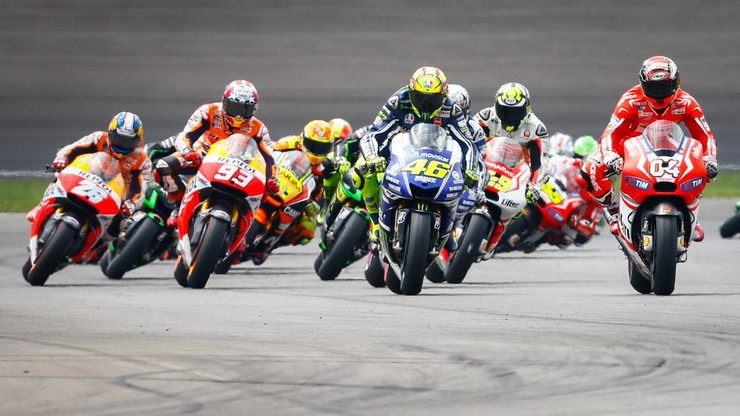 Group of MotoGP Riders in Race