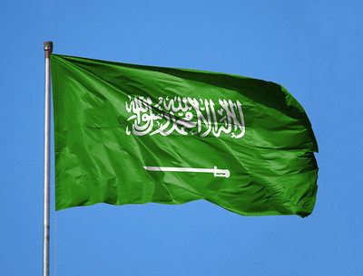 Saudi Arabia Flag Against Blue Sky